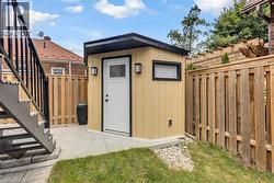 Shed, with electricity, tucked into the corner. - 