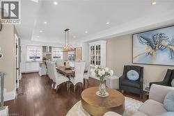 A view into the dining room and kitchen from the living room. - 