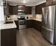 224 3630 Haughton Road E, Regina, SK  - Indoor Photo Showing Kitchen With Stainless Steel Kitchen With Upgraded Kitchen 