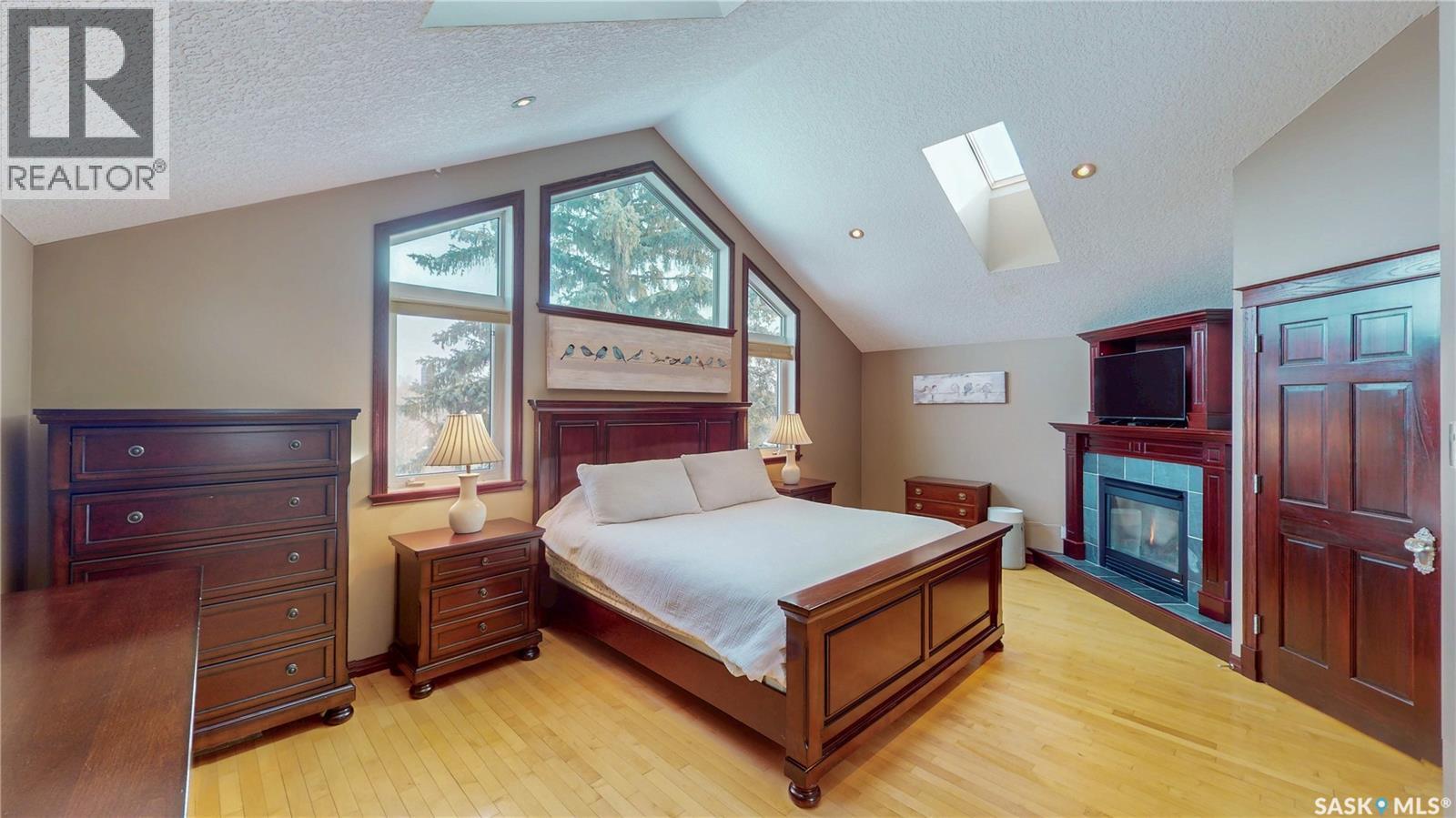 2830 Regina Avenue, Regina, SK - Indoor Photo Showing Bedroom With Fireplace