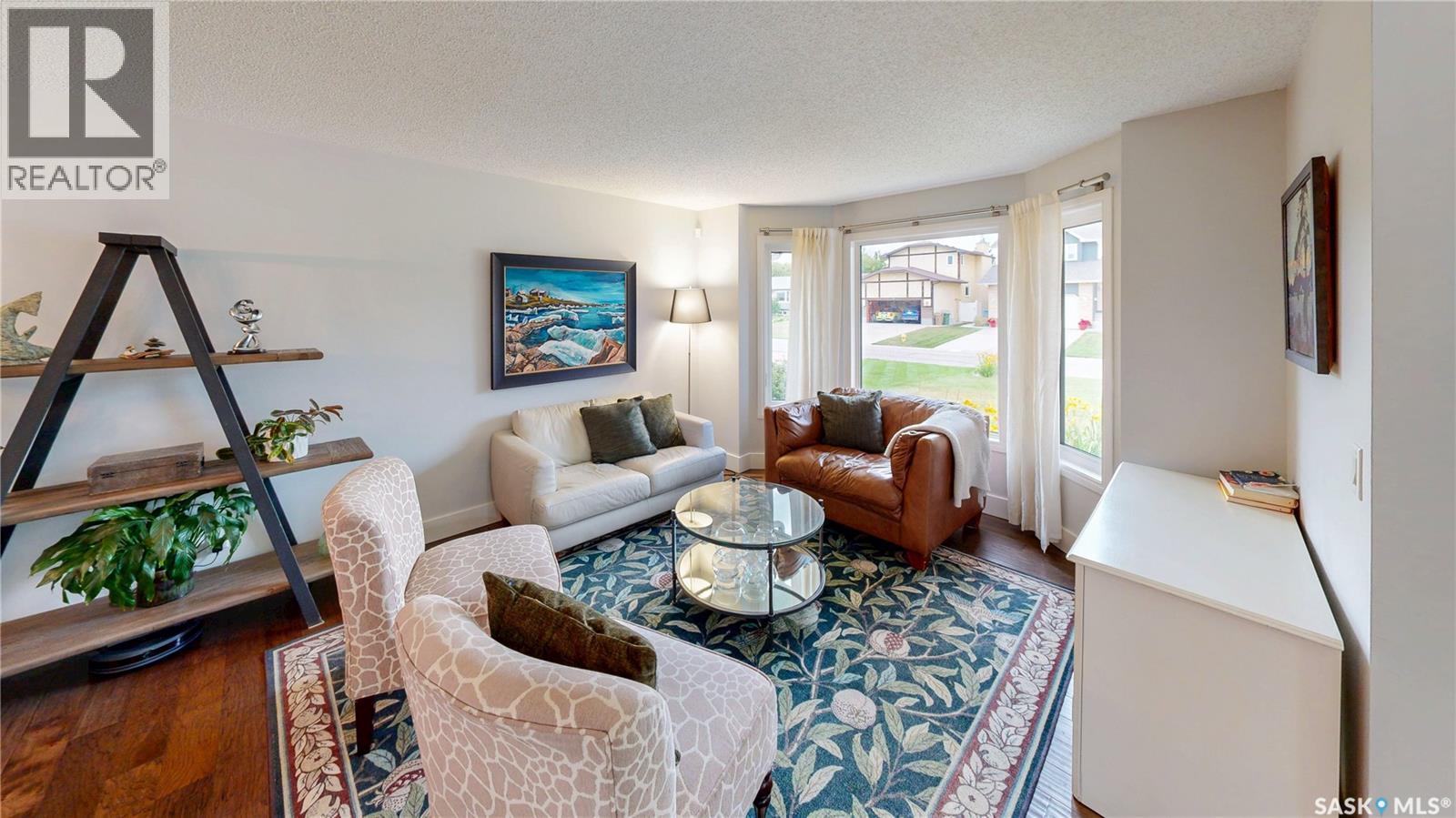 7551 Butler Bay, Regina, SK - Indoor Photo Showing Living Room