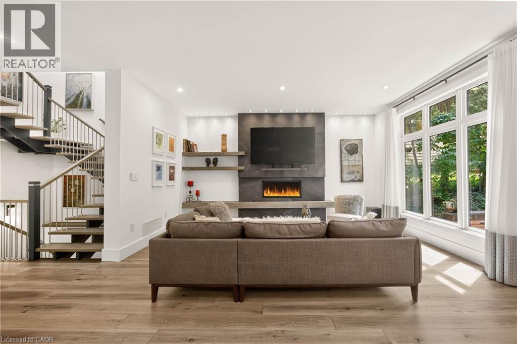 700 Hillcrest Road, West Shore, ON - Indoor Photo Showing Living Room With Fireplace