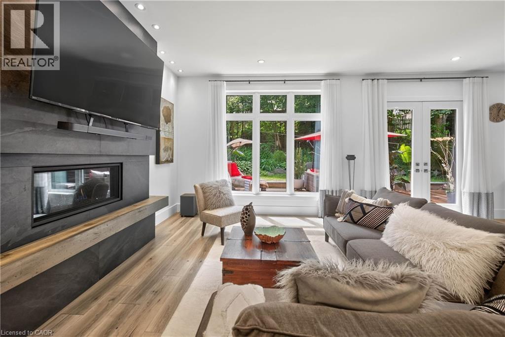 700 Hillcrest Road, West Shore, ON - Indoor Photo Showing Living Room With Fireplace