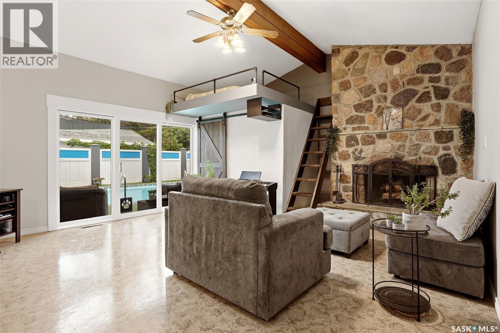 2705 Grant Road, Regina, SK - Indoor Photo Showing Living Room With Fireplace