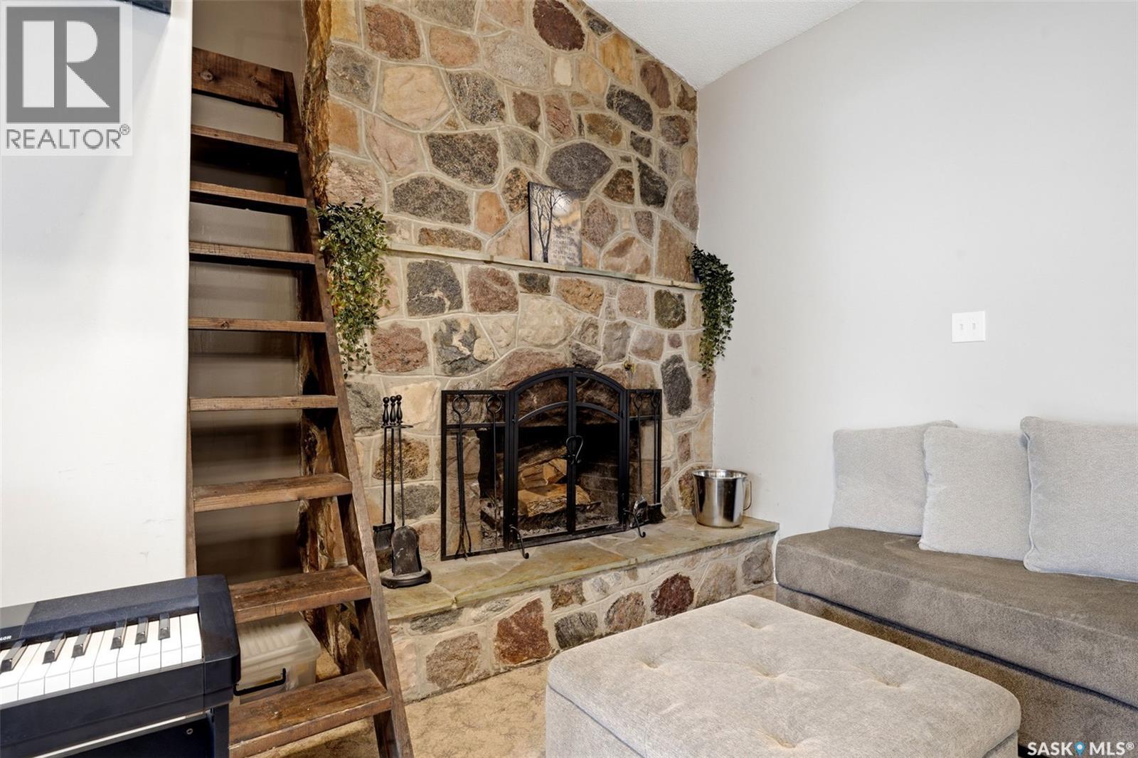2705 Grant Road, Regina, SK - Indoor With Fireplace
