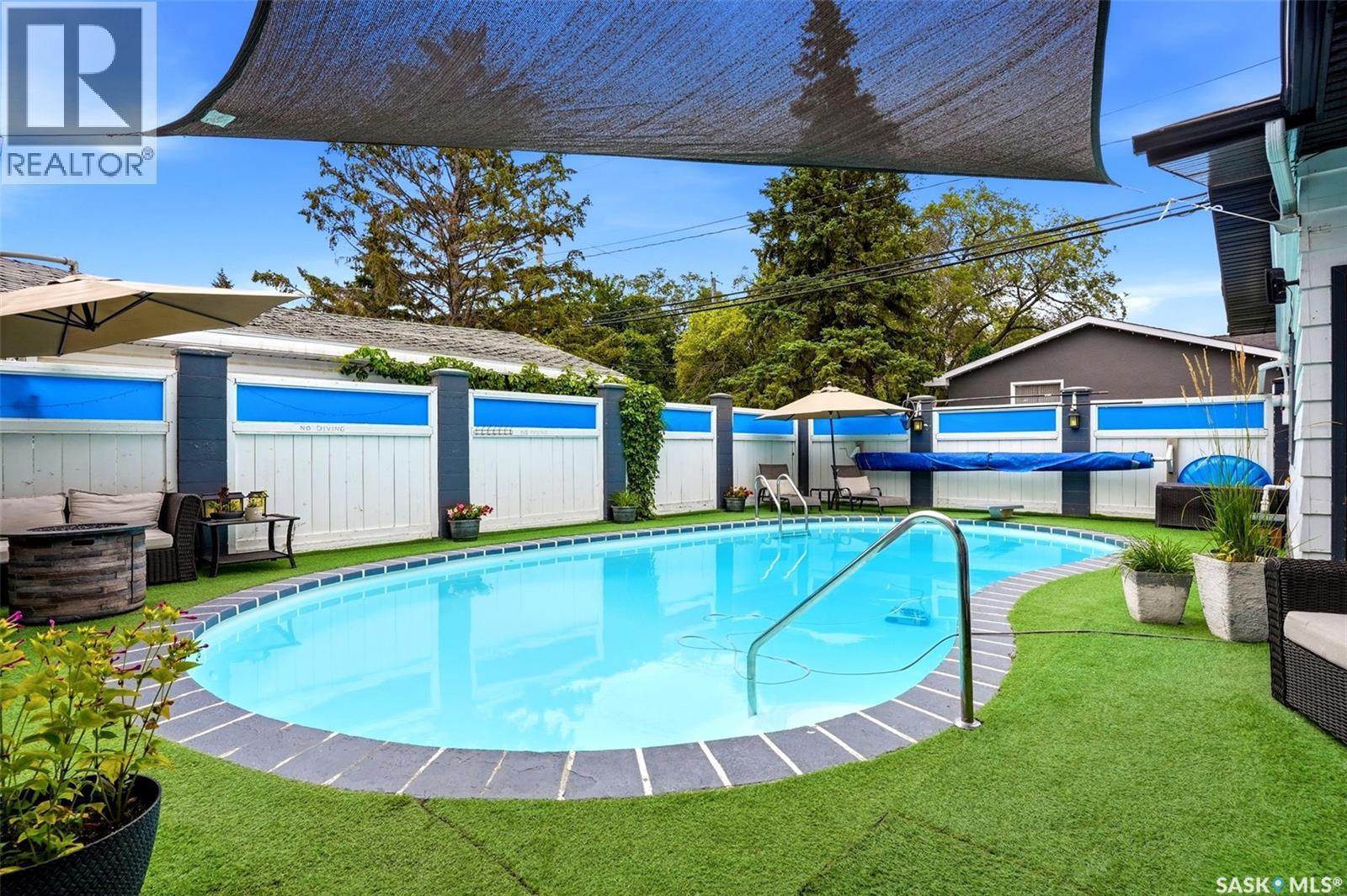 2705 Grant Road, Regina, SK - Outdoor With In Ground Pool With Backyard