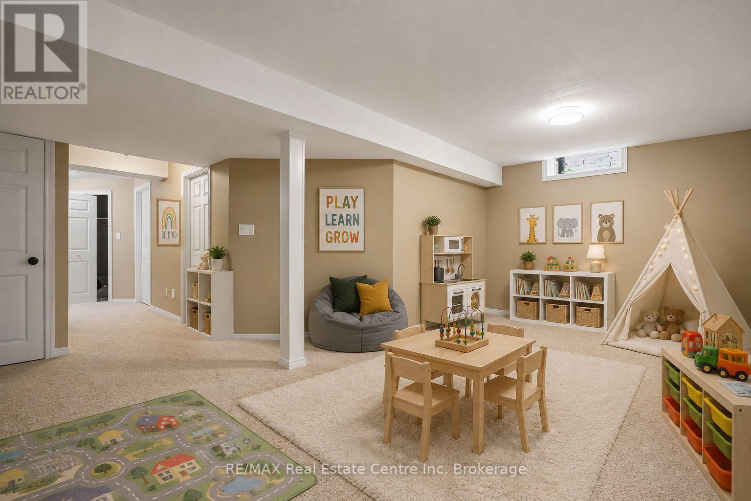 Virtually staged area of the rec room - 115 Mcfarlane Drive, Cambridge, ON - Indoor Photo Showing Basement
