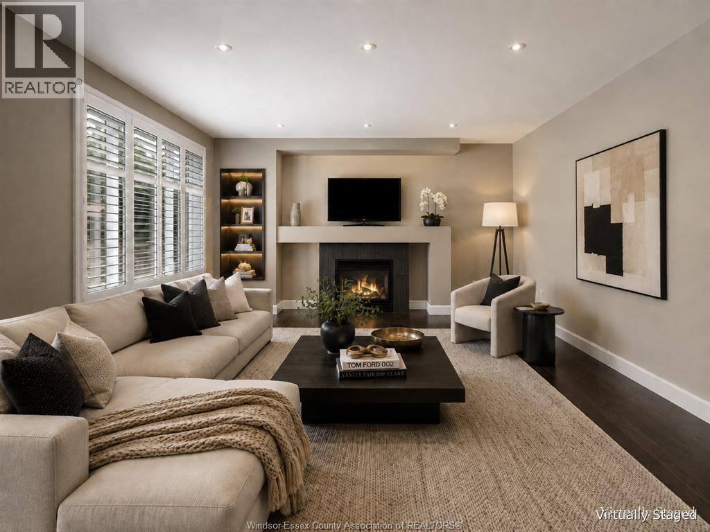 6181 Silver Maple, Lasalle, ON - Indoor Photo Showing Living Room With Fireplace