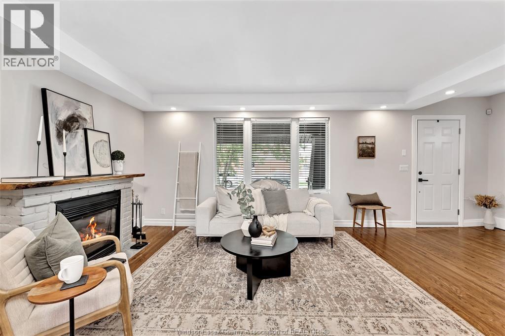 1362 Elsmere, Windsor, ON - Indoor Photo Showing Living Room With Fireplace