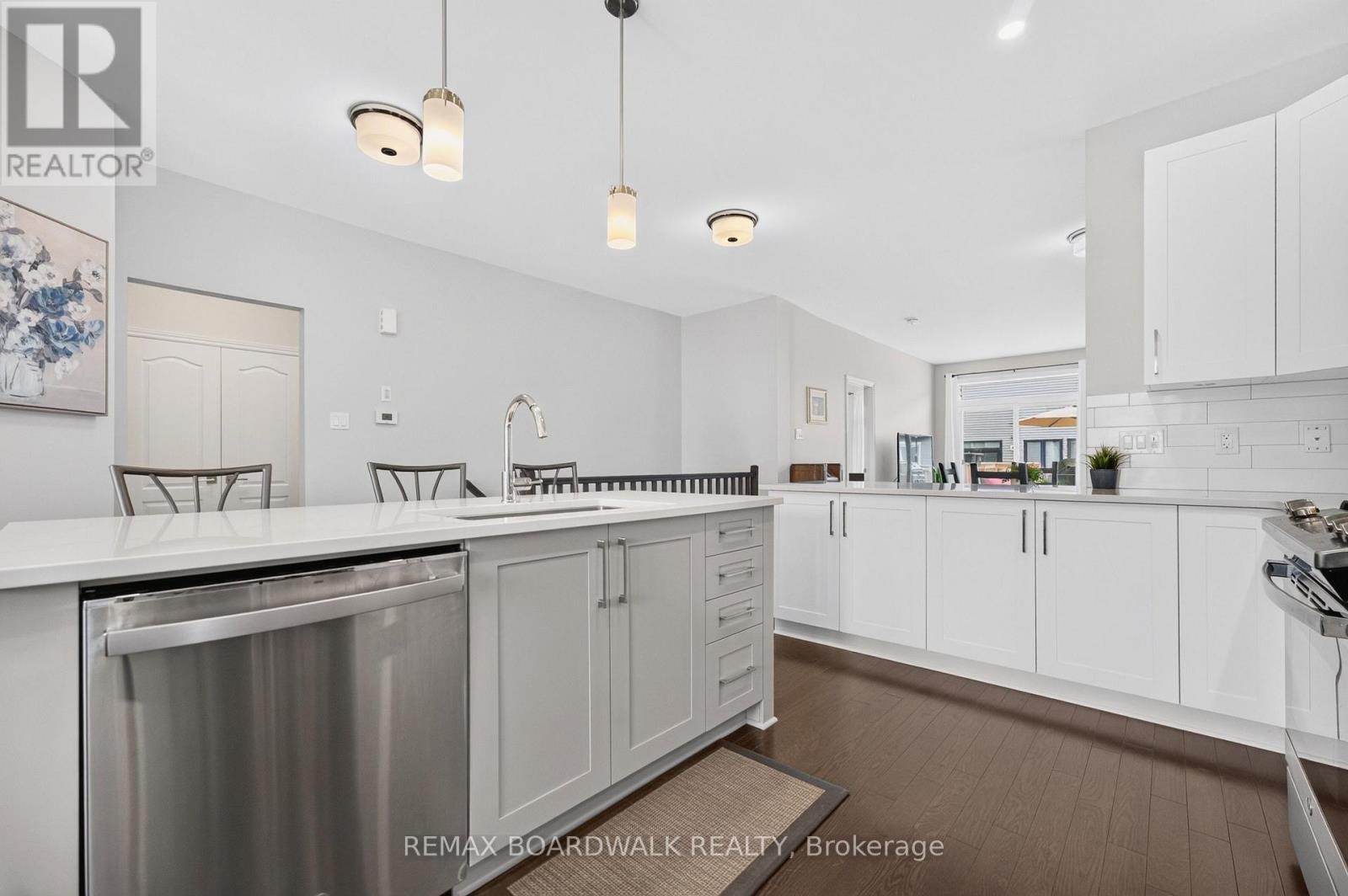 Kitchen is Open to the Dining + Living Room - 224 Maygrass Way, Ottawa, ON - Indoor Photo Showing Kitchen With Upgraded Kitchen