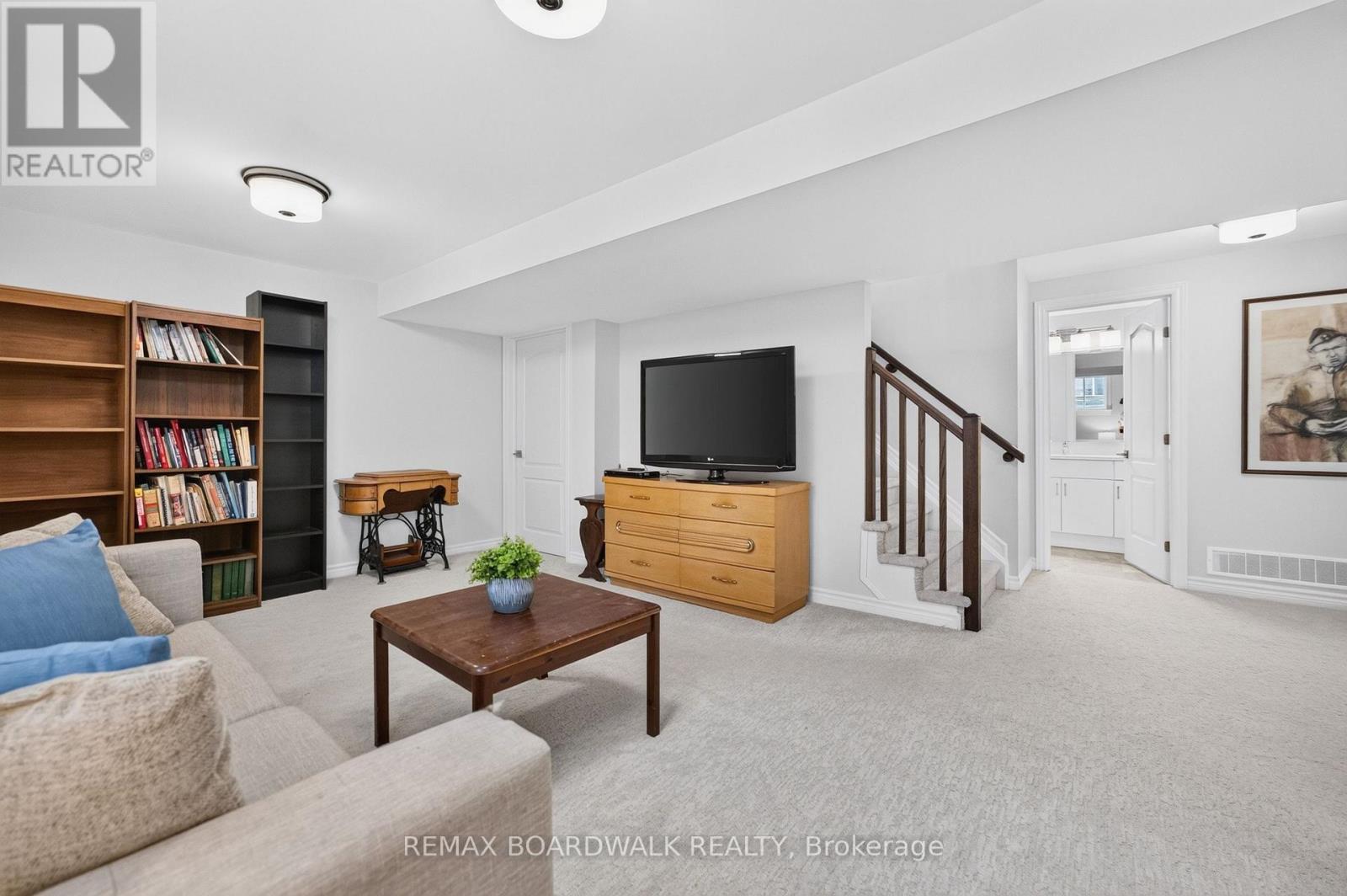 Basement Fam Rm + 4PC Bath, 2nd Bedroom & Laudry - 224 Maygrass Way, Ottawa, ON - Indoor Photo Showing Living Room