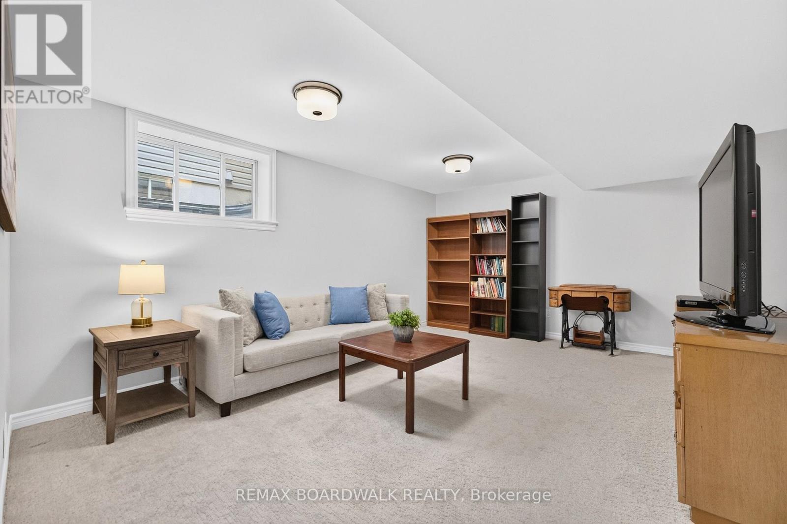 Basement Family Room w/ Great Size Windows - 224 Maygrass Way, Ottawa, ON - Indoor Photo Showing Other Room