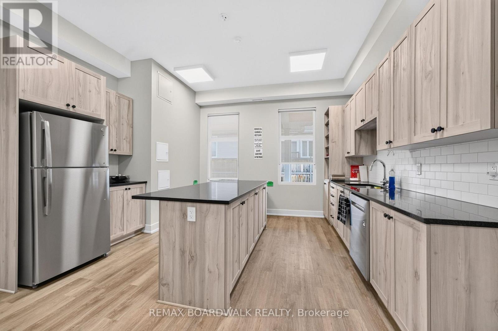 Facility Includes: Kitchen on each level - 224 Maygrass Way, Ottawa, ON - Indoor Photo Showing Kitchen With Upgraded Kitchen