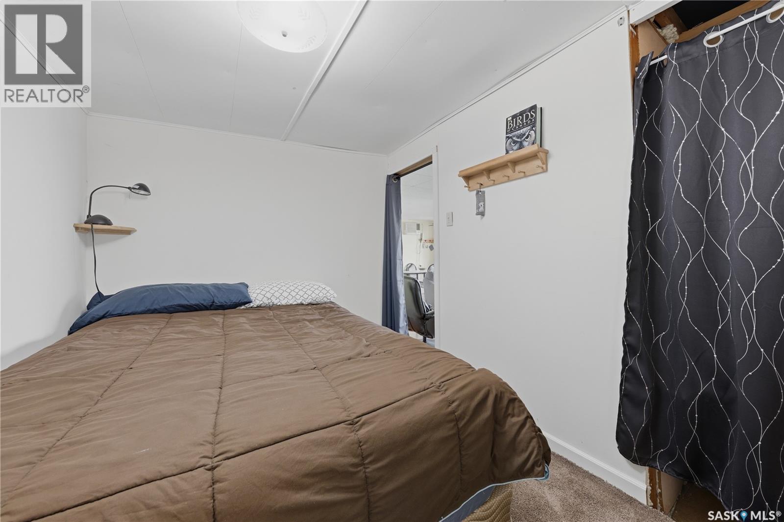 65 Pelican Drive, Pelican Pointe, SK - Indoor Photo Showing Bedroom