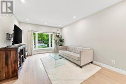 Living Room with New Engineered Hardwood Flooring - 
