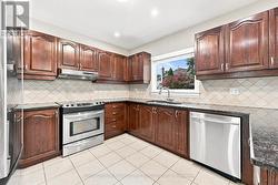 Functional Kitchen with Stainless Steel Appliances - 