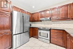 Kitchen Features Granite Countertops and a Pantry - 