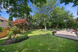 Enjoy Mature Trees and Lush Manicured Gardens - 