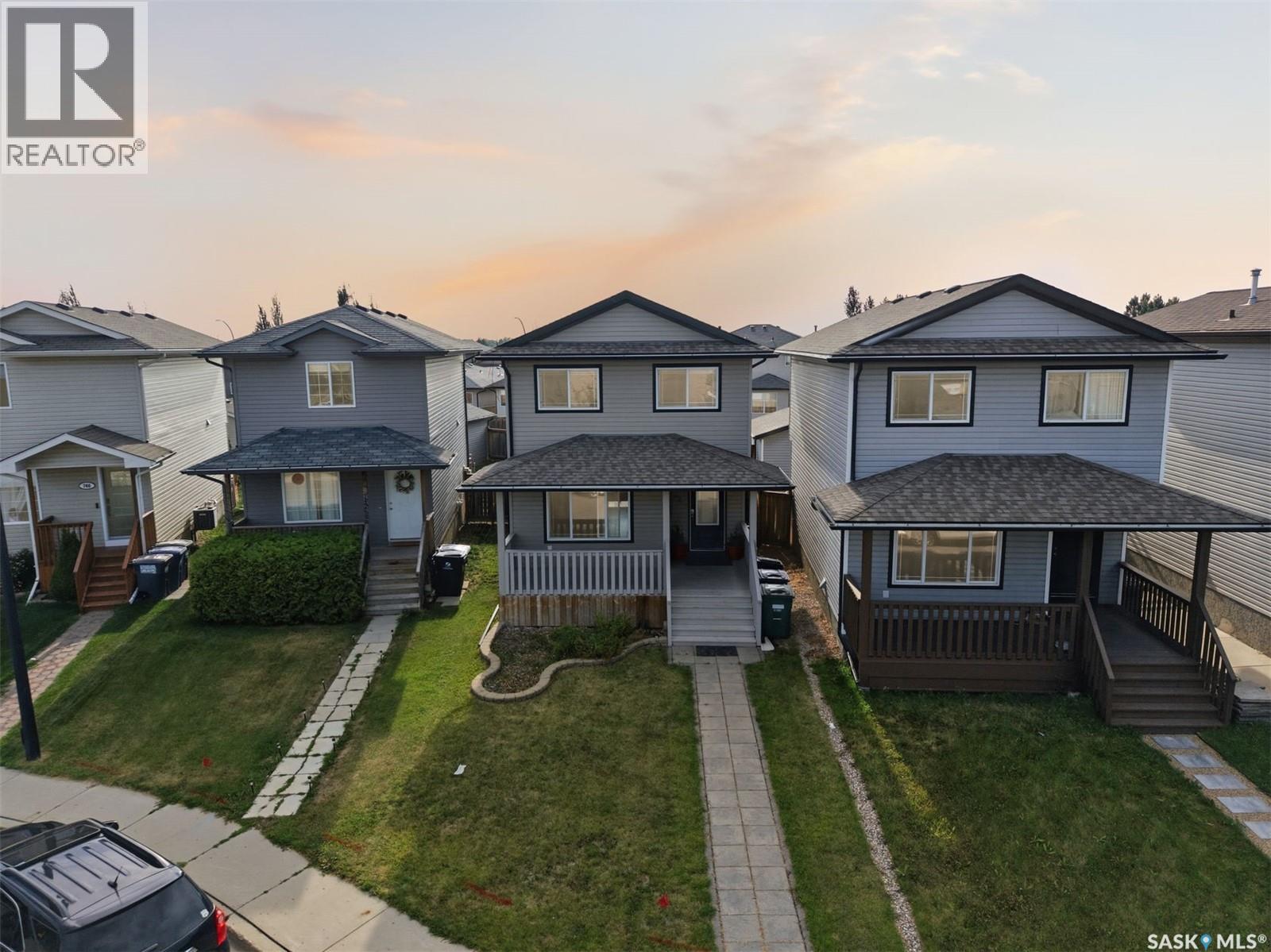 738 Lamarsh Lane, Saskatoon, SK - Outdoor With Deck Patio Veranda With Facade