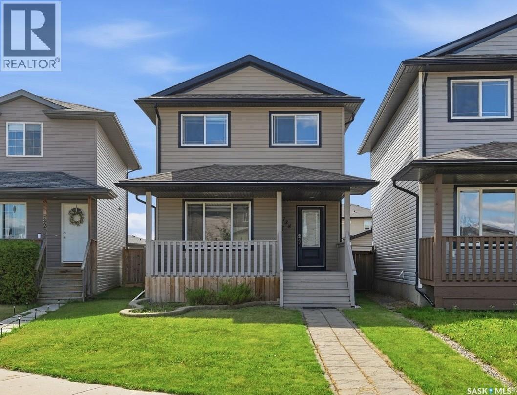 738 Lamarsh Lane, Saskatoon, SK - Outdoor With Deck Patio Veranda With Facade