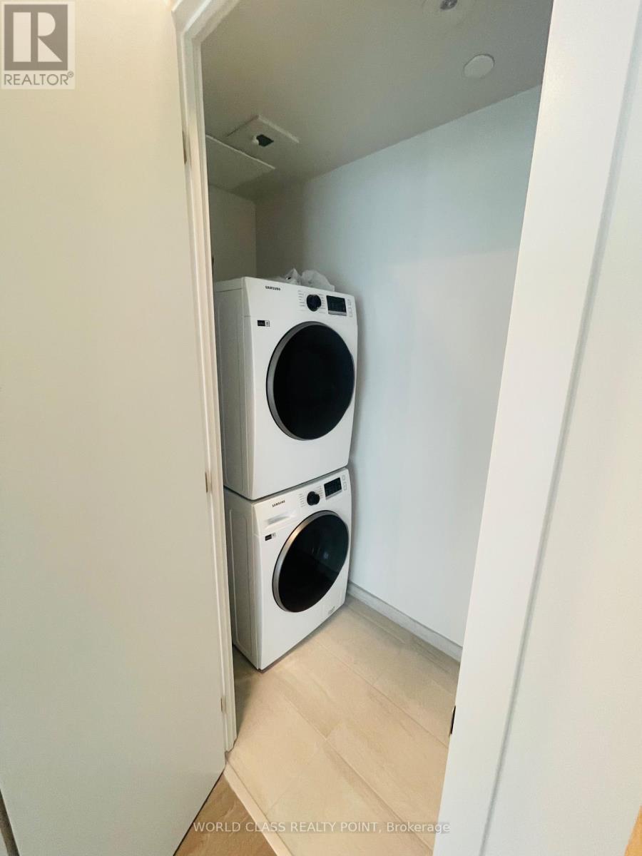 2404 - 8 Cumberland Street, Toronto, ON - Indoor Photo Showing Laundry Room