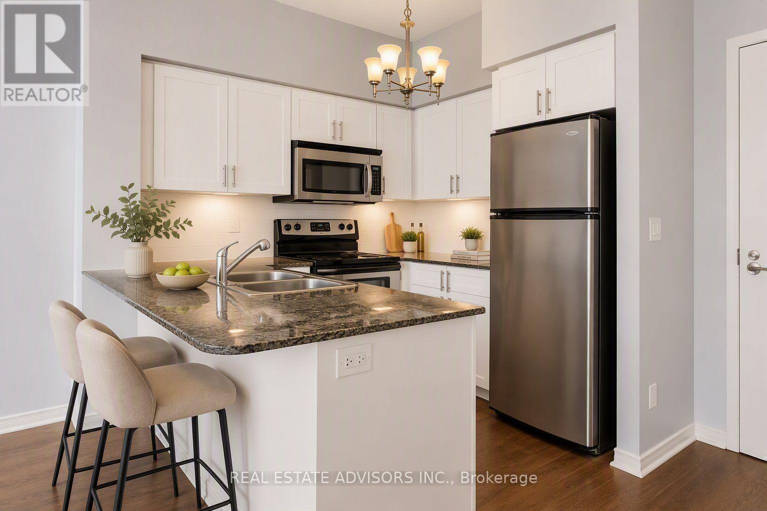 204 - 15 Legion Road, Toronto, ON - Indoor Photo Showing Kitchen With Stainless Steel Kitchen With Double Sink