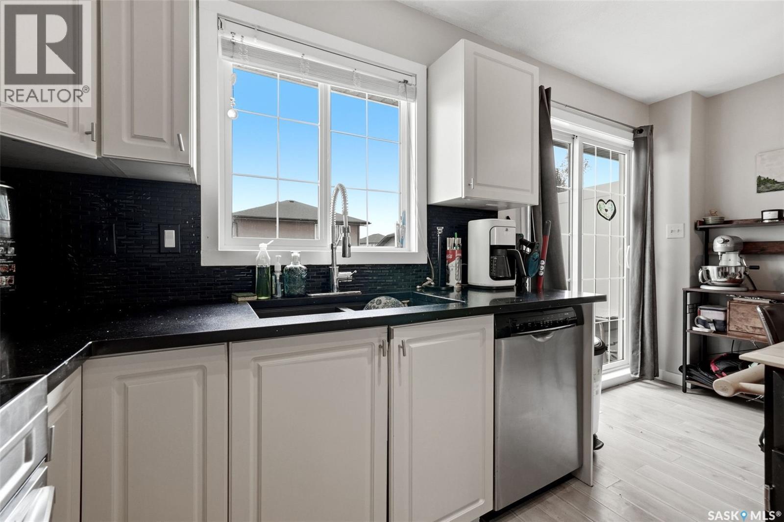3754 Cormorant Drive E, Regina, SK - Indoor Photo Showing Kitchen With Double Sink
