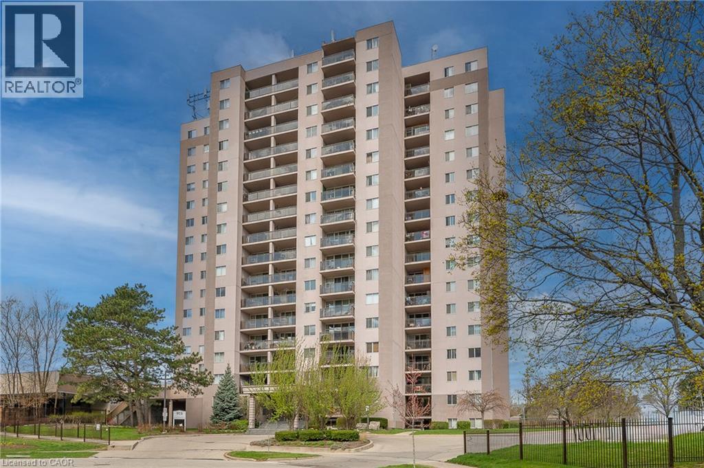 Multi-story residential building featuring numerous private balconies with glass railings - 975 Warwick Court Unit# 708, Burlington, ON - Outdoor With Balcony With Facade