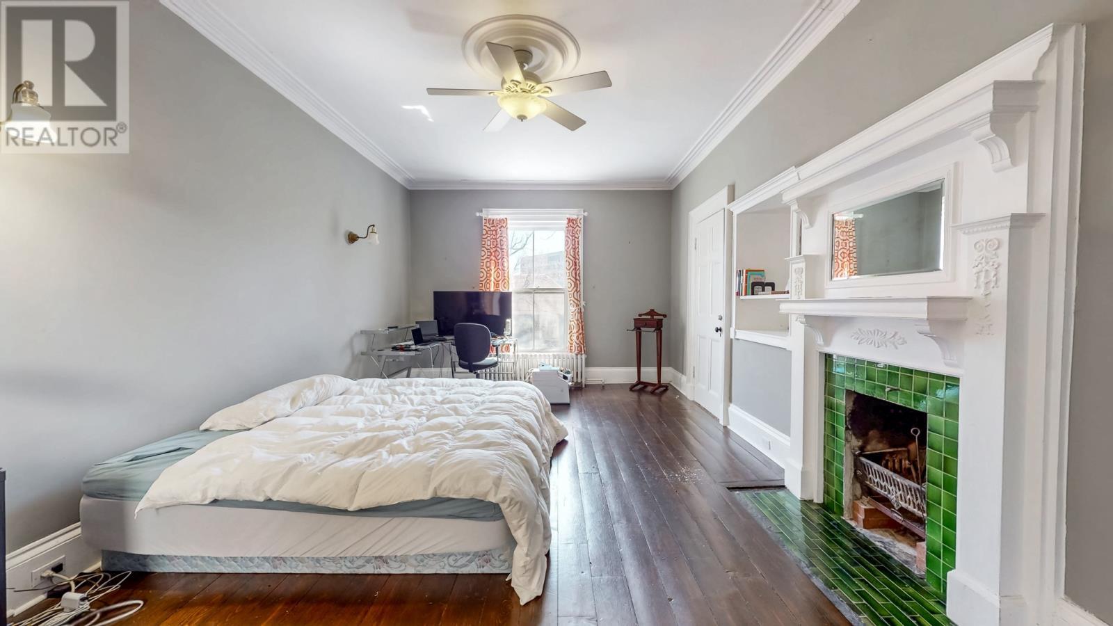 3A Forest Road, St. John'S, NL - Indoor Photo Showing Bedroom With Fireplace