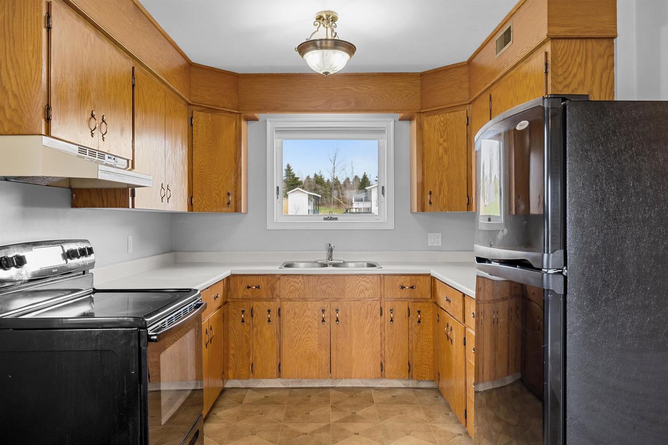 7 Bayview Crescent, Souris West, PE - Indoor Photo Showing Kitchen With Double Sink