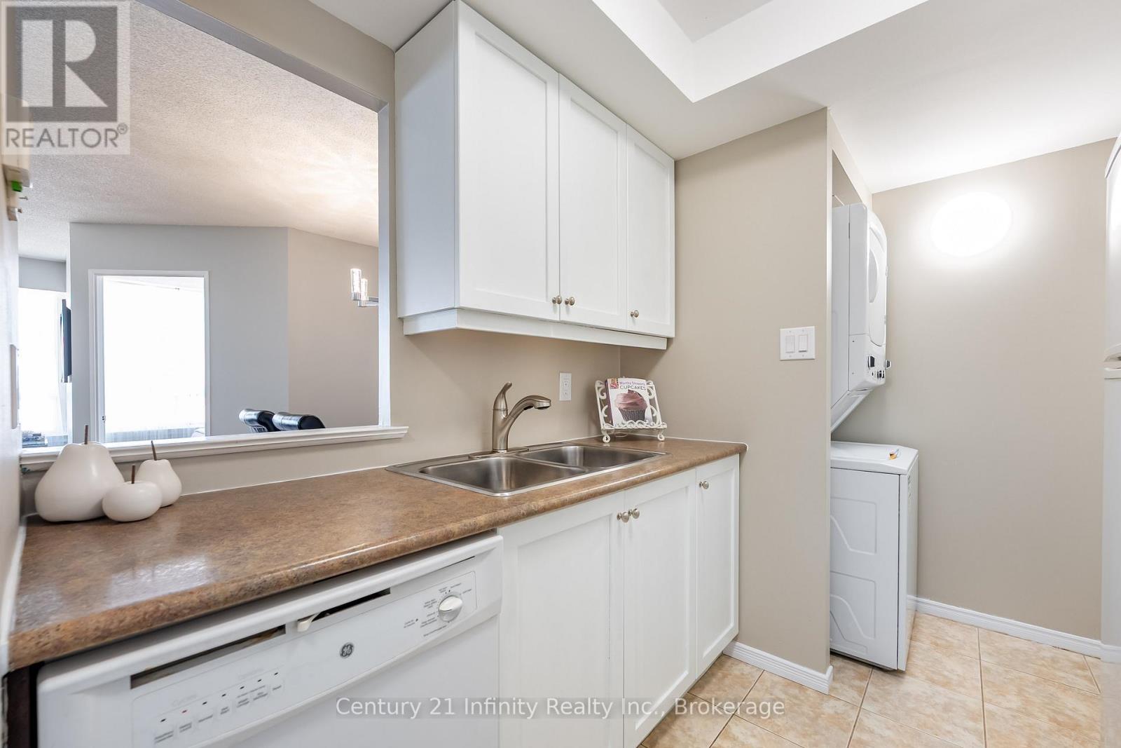 Kitchen (laundry at end) - 1206 - 5 Greystone Walk Drive, Toronto (Kennedy Park), ON - Indoor