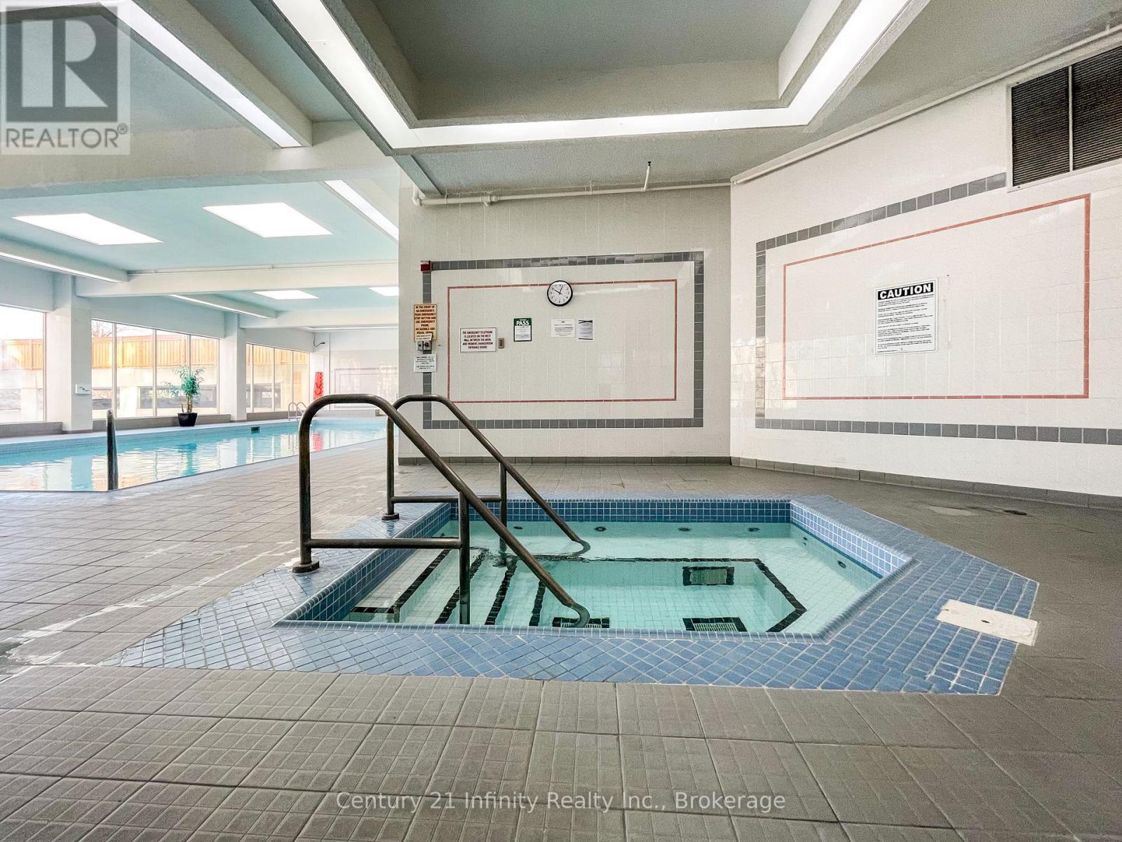 Indoor Hot Tub - 1206 - 5 Greystone Walk Drive, Toronto (Kennedy Park), ON - Indoor Photo Showing Other Room With In Ground Pool