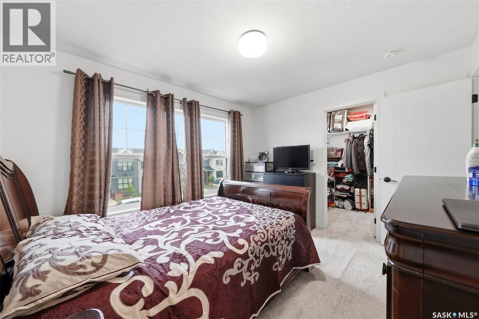 132 Rosewood Boulevard E, Saskatoon, SK - Indoor Photo Showing Bedroom