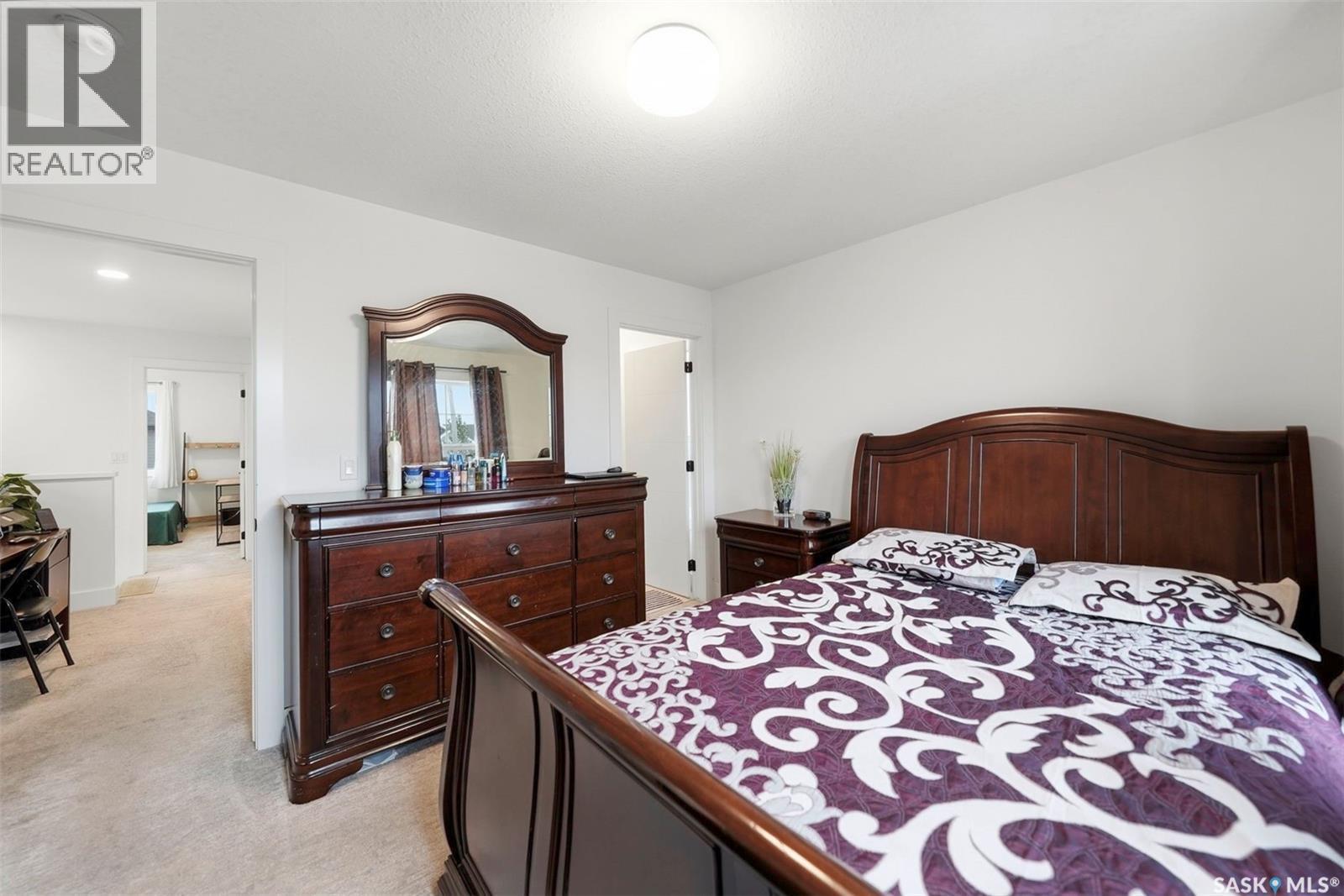 132 Rosewood Boulevard E, Saskatoon, SK - Indoor Photo Showing Bedroom