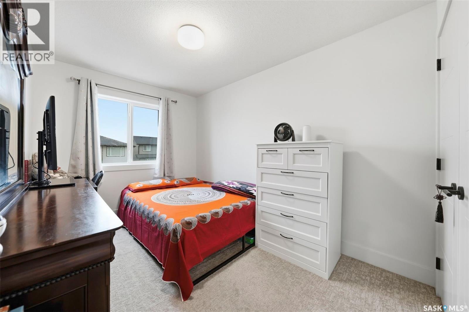 132 Rosewood Boulevard E, Saskatoon, SK - Indoor Photo Showing Bedroom