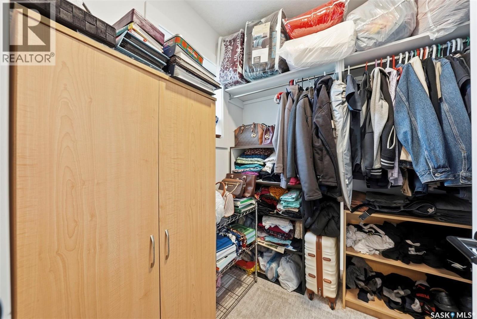 132 Rosewood Boulevard E, Saskatoon, SK - Indoor With Storage