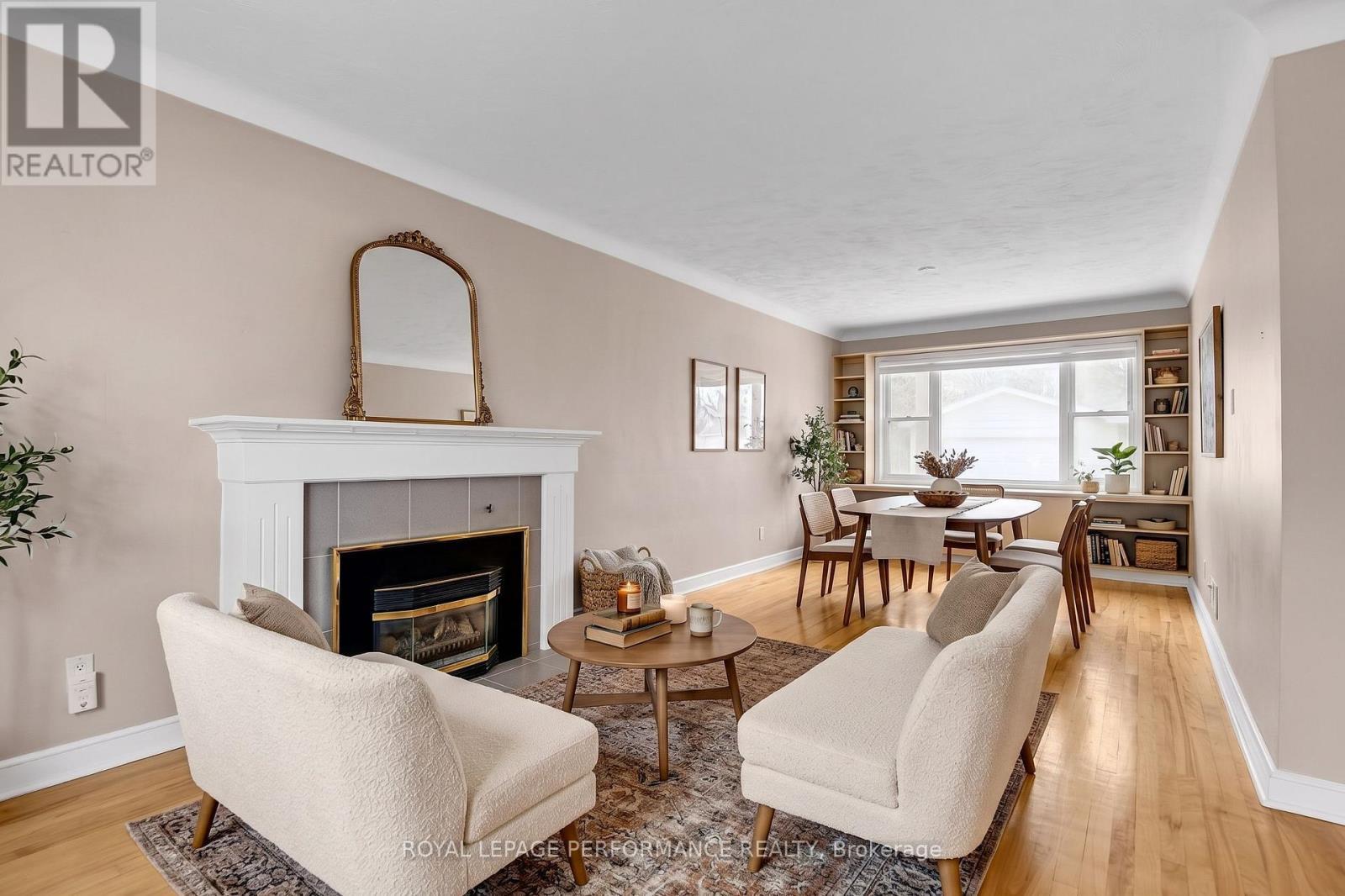 Virtually Staged - 166 Winther Avenue, Ottawa, ON - Indoor Photo Showing Living Room With Fireplace