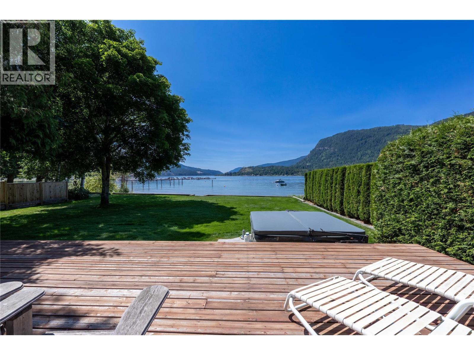 413 97A Highway, Sicamous, BC - Outdoor With Body Of Water With Deck Patio Veranda