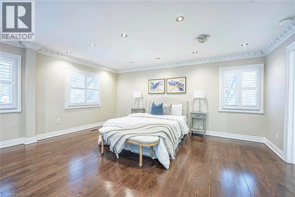 Spacious room featuring rich wood-finish flooring and multiple recessed ceiling lights - 247 Sand Road, Holland Landing, ON - Indoor Photo Showing Bedroom