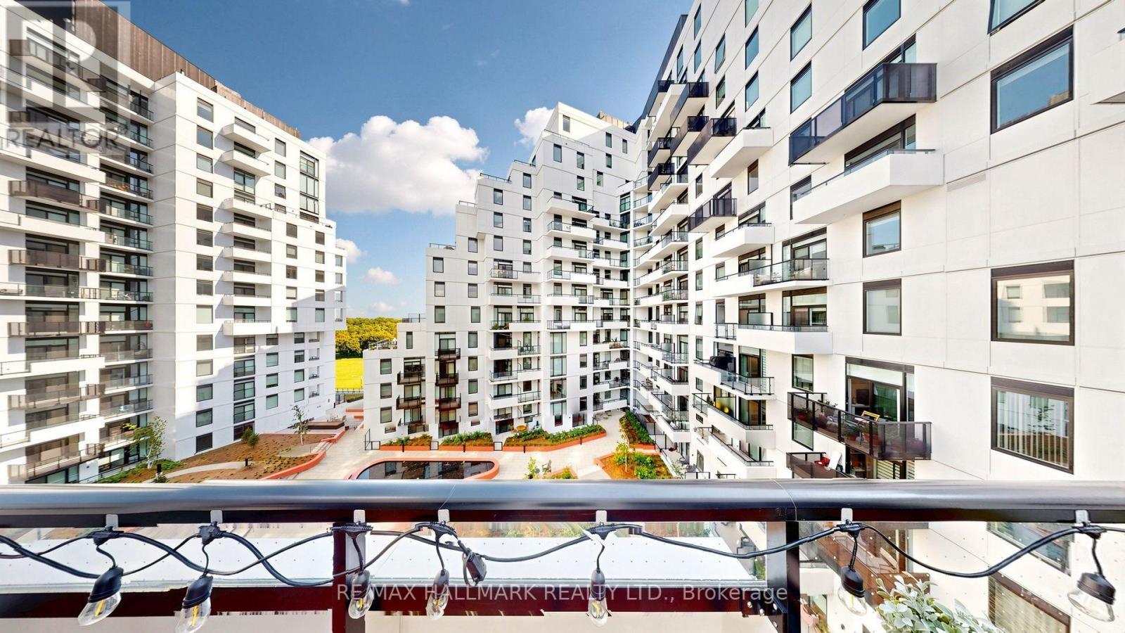 823 - 1050 Eastern Avenue, Toronto, ON - Outdoor With Balcony With Facade