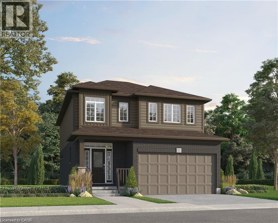 Two-story residence featuring a dark brick and siding facade, an integrated two-car garage, and a covered entry with a transom window - 443 Benninger Drive, Kitchener, ON - Outdoor With Facade