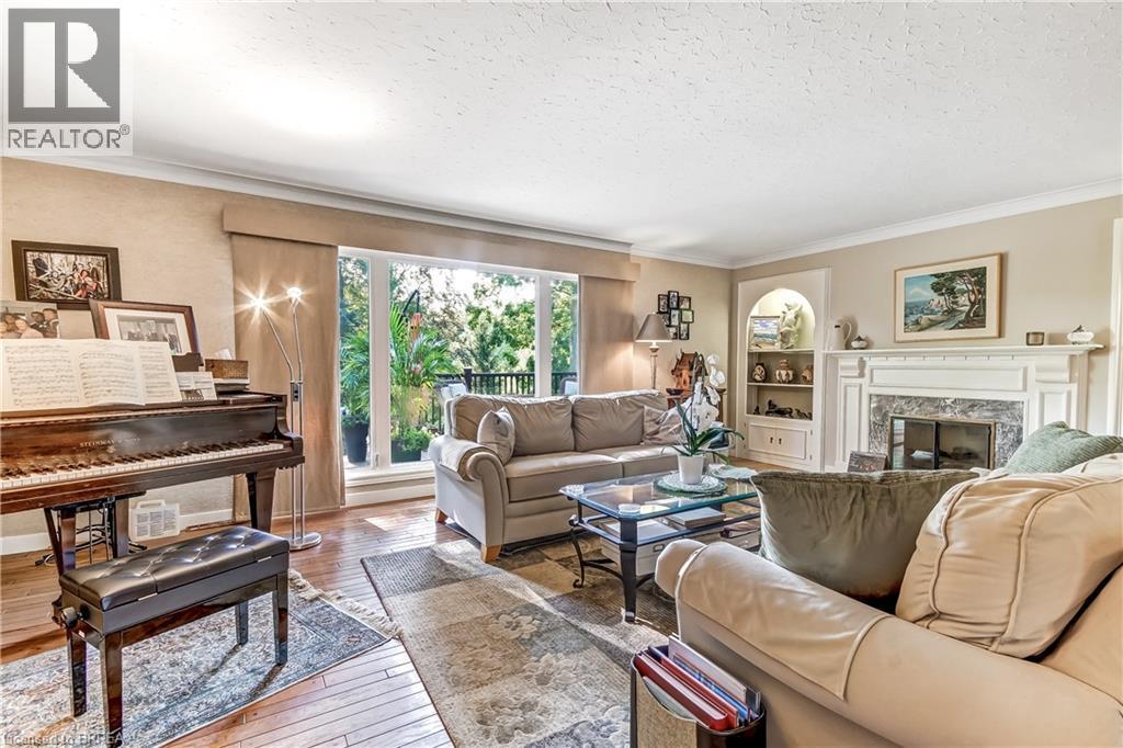 19 Oakley Road, Brantford, ON - Indoor Photo Showing Living Room With Fireplace