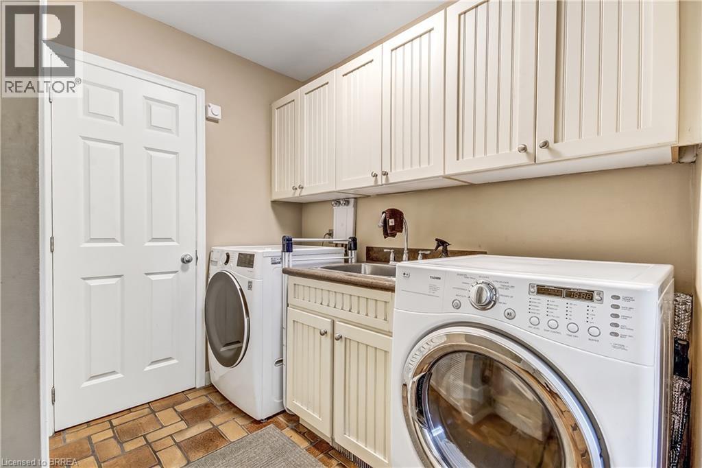 Main Floor Laundry - 19 Oakley Road, Brantford, ON - Indoor Photo Showing Laundry Room