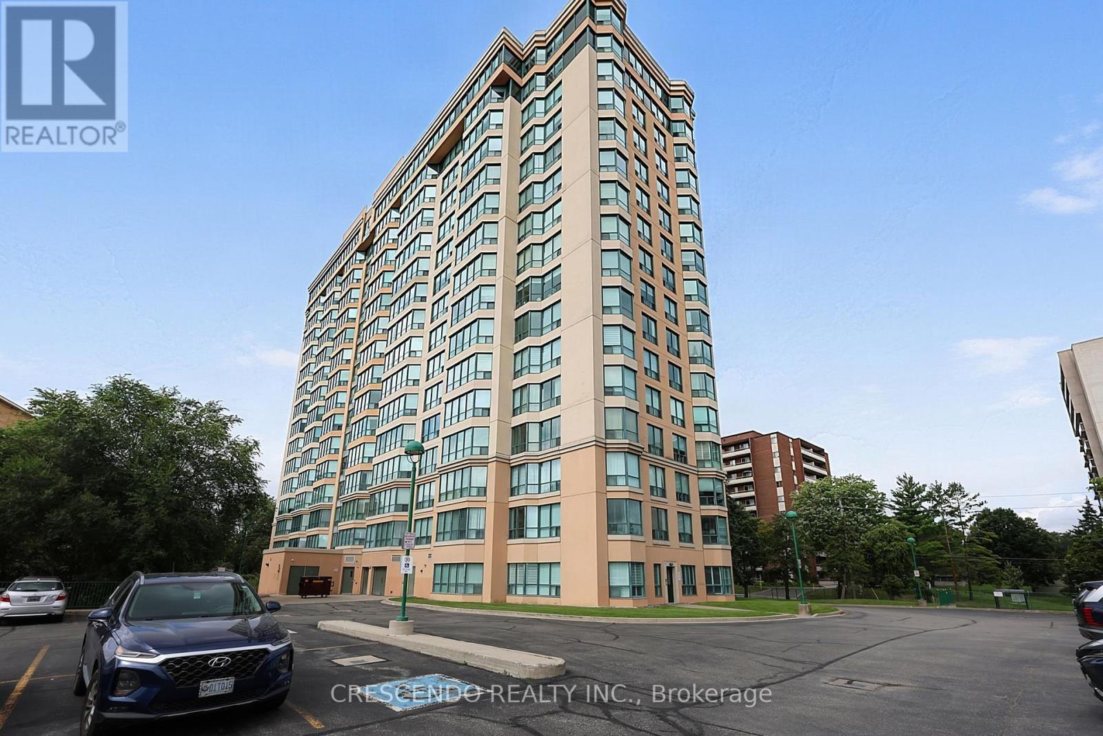 201 - 100 Millside Drive, Milton, ON - Outdoor With Facade