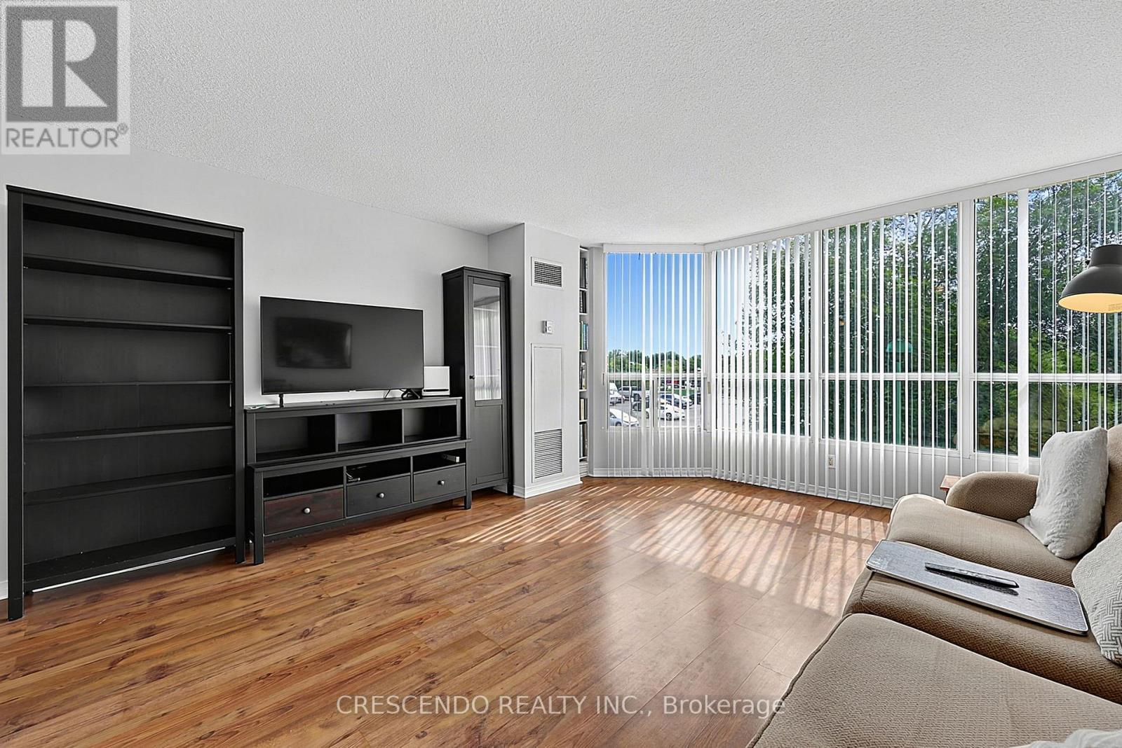 201 - 100 Millside Drive, Milton, ON - Indoor Photo Showing Living Room
