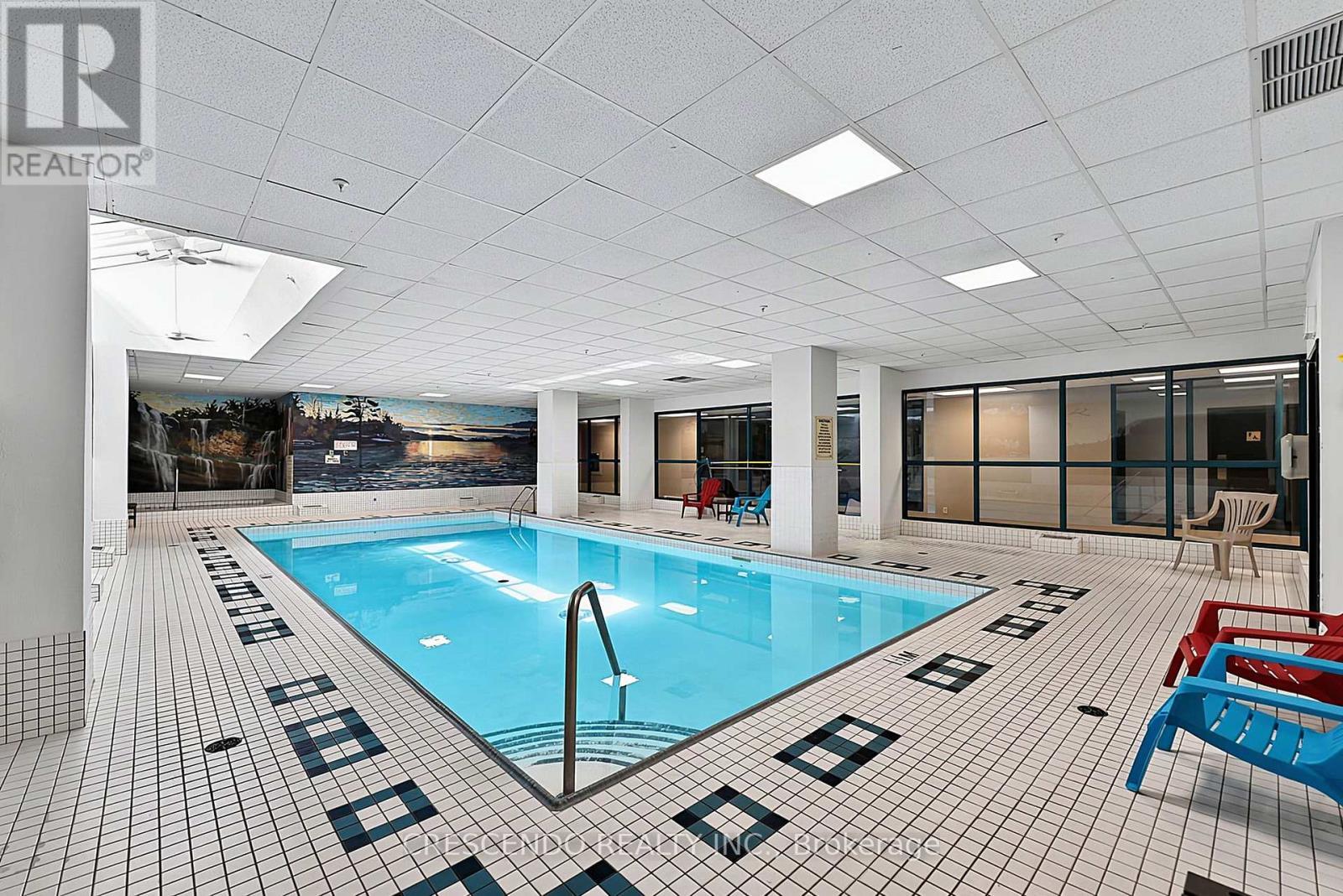 201 - 100 Millside Drive, Milton, ON - Indoor Photo Showing Other Room With In Ground Pool