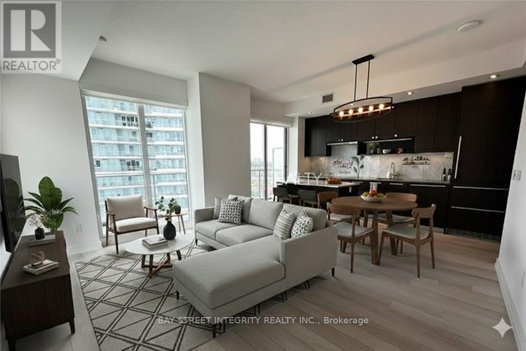 303 - 117 Mcmahon Drive, Toronto, ON - Indoor Photo Showing Living Room