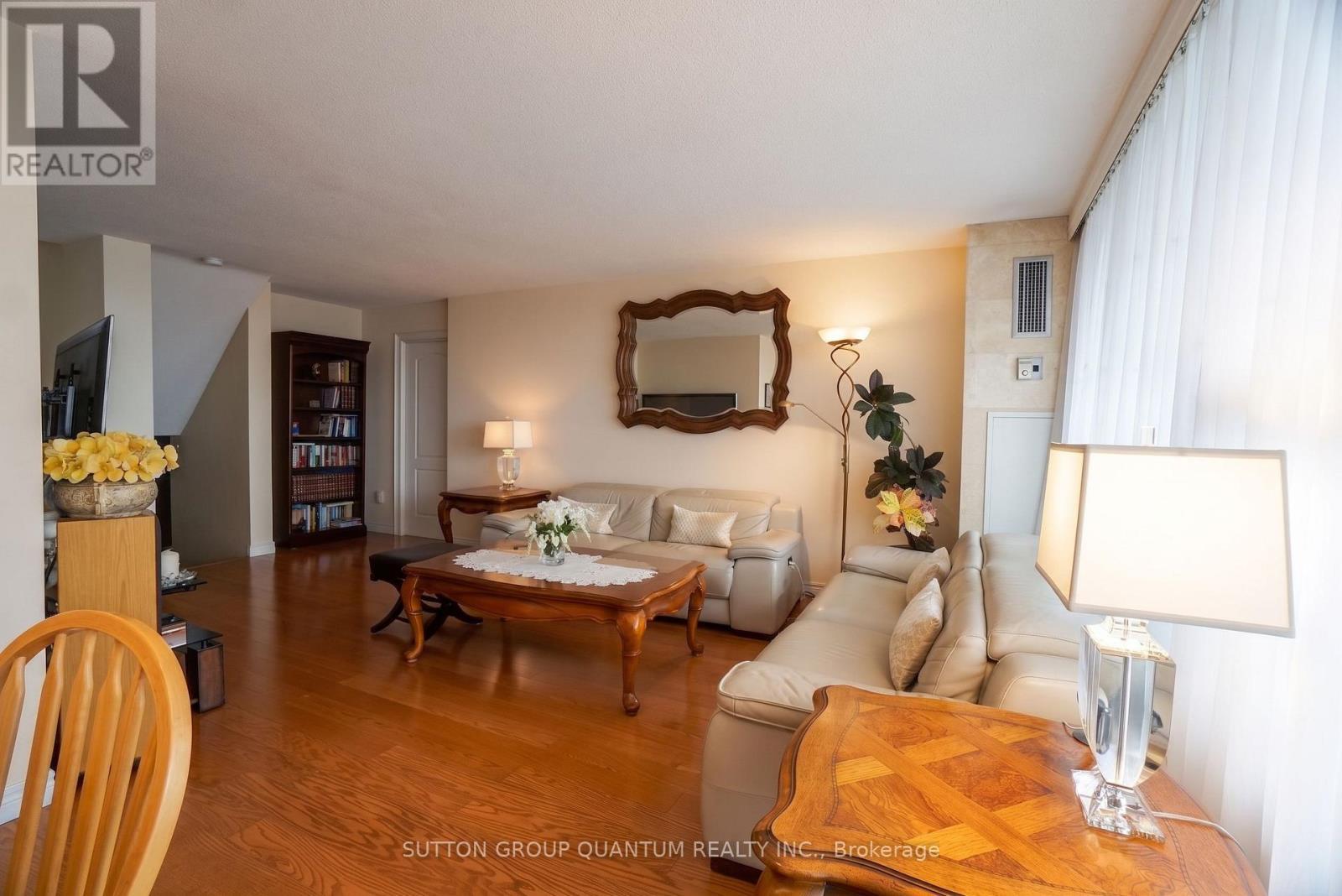 1810 - 11 Wincott Drive, Toronto, ON - Indoor Photo Showing Living Room