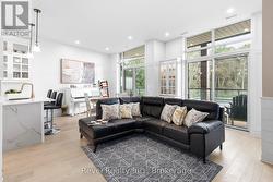 Living Area W/ Fireplace & Extra Large Patio Doors - 
