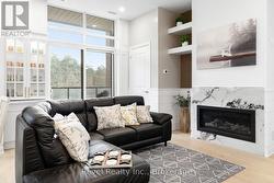 Living Area W/ Fireplace & Extra Large Patio Doors - 